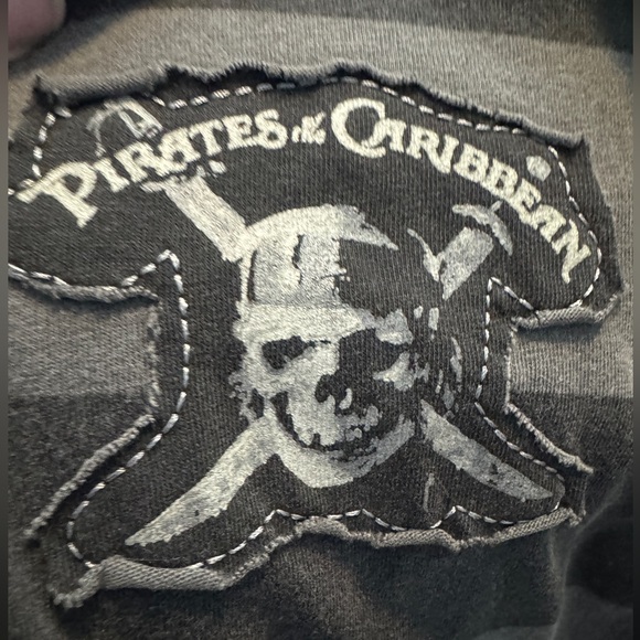 NWOT Men’s distressed Pirates of the Caribbean polo from Disneyland. - Picture 11 of 12
